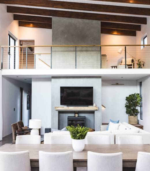 Modern living room with high ceilings, large TV, and stylish furniture, copy space. Interiors, luxury, home, design, decor, lifestyle